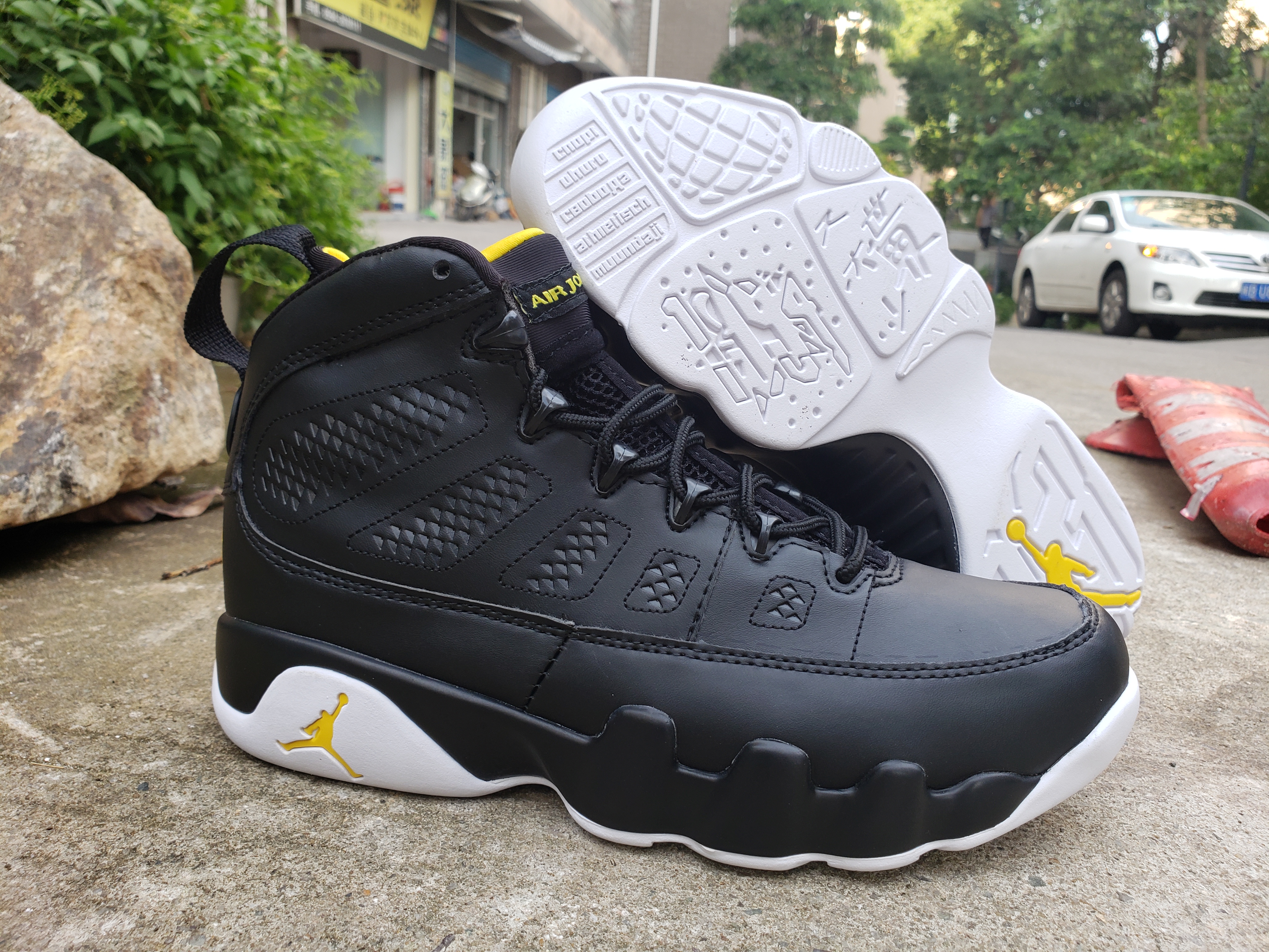 jordan 9 black and yellow