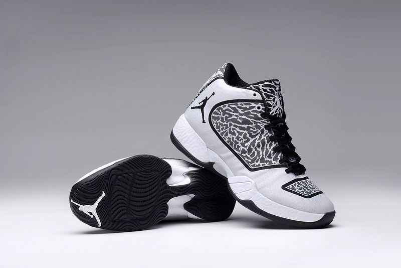 white and black jordans 29