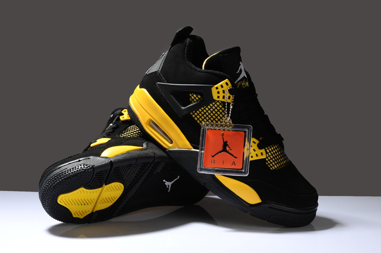 black and yellow jordan 4s